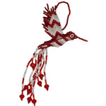 A handmade beaded hummingbird ornament, crafted with red and white seed beads, featuring a hanging loop at the top and dangling bead strands at the tail, shown on a plain white background.