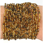 Golds and Peacock Brown 24 - Strand Beaded Bracelet - A Thread of Hope Guatemalan Fair Trade