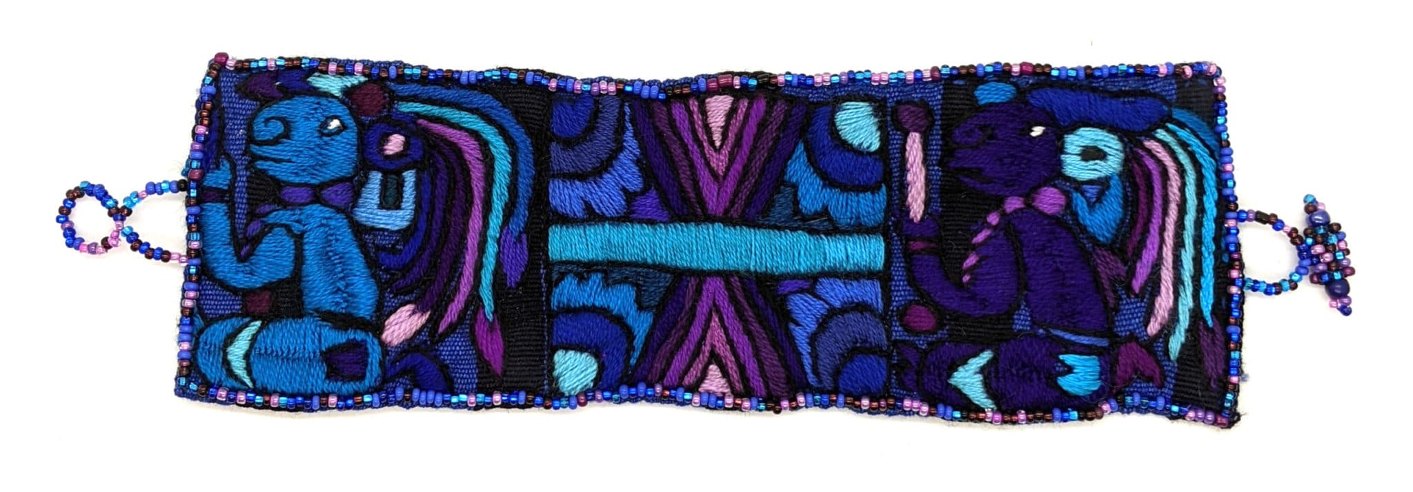 Blues and Purples Maya Gods and Symbols Hand-Embroidered Bracelet with Glass Beads Closure